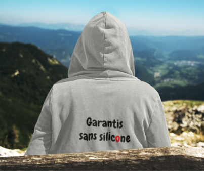 Sweat-shirt avec logo et texte à l'avant, et inscription "Garantis sans silicone" à l'arrière