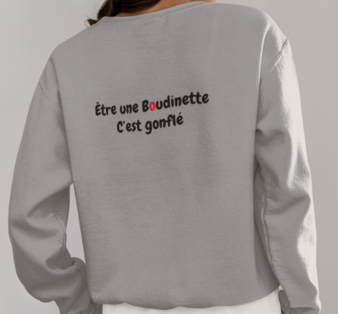 Sweat-shirt avec logo à l'avant, et inscription "Être une Boudinette c’est gonflé" à l'arrière